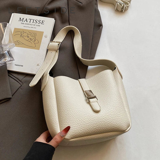 Iris™ – Nowoczesna torba typu bucket o skórzanym wyglądzie