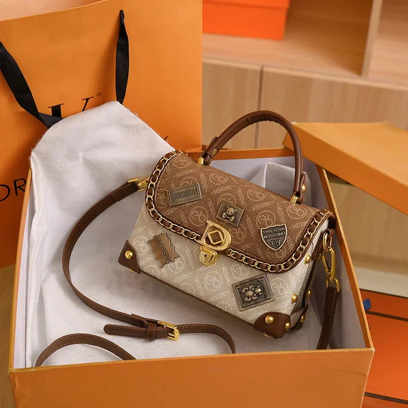 Retro torba na ramię z monogramem i złotymi detalami Zelda™