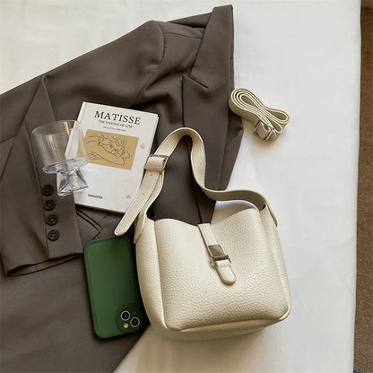 Iris™ – Nowoczesna torba typu bucket o skórzanym wyglądzie