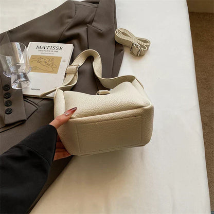 Iris™ – Nowoczesna torba typu bucket o skórzanym wyglądzie